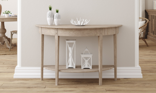 White floor trim behind a small hallway table